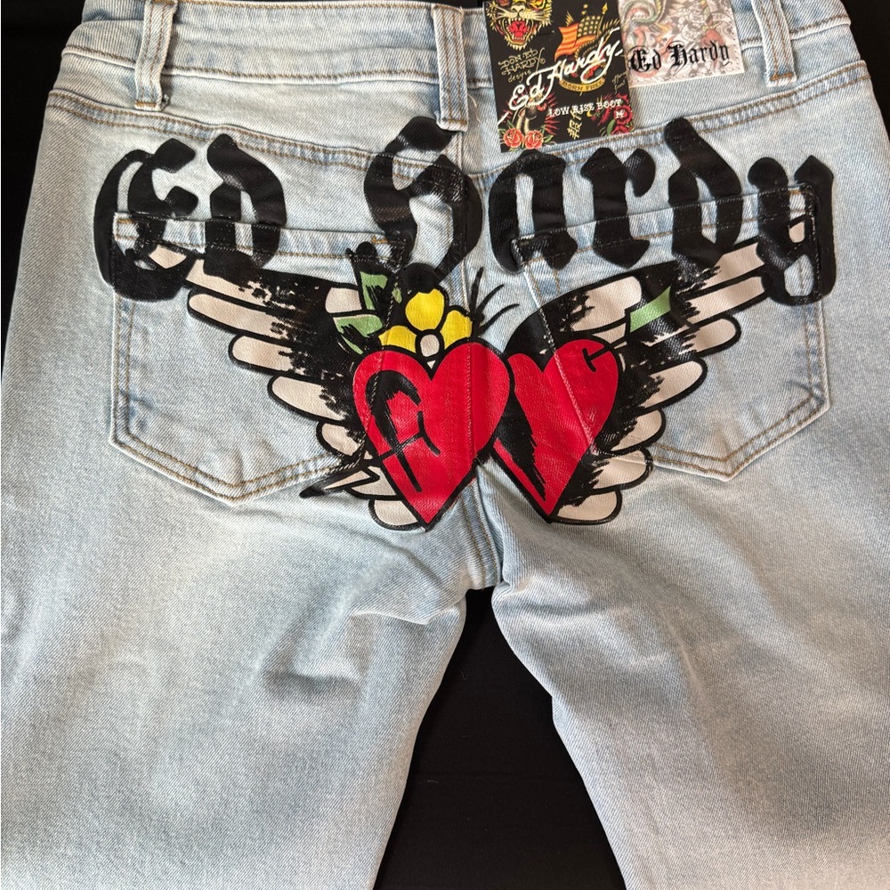 Ed Hardy Light Wash Denim Jeans with Red Heart Wing Graphic